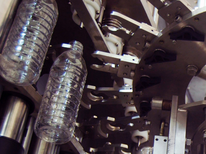 Blowing, filling and capping machine