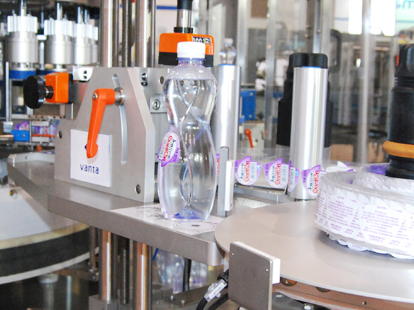 Adhesive labeling machine