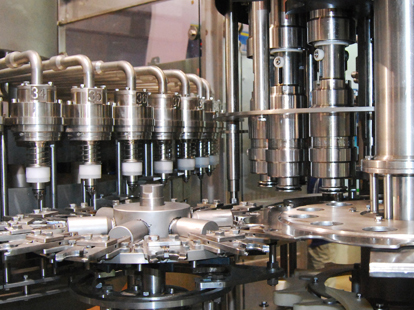 Blowing, filling and capping machine