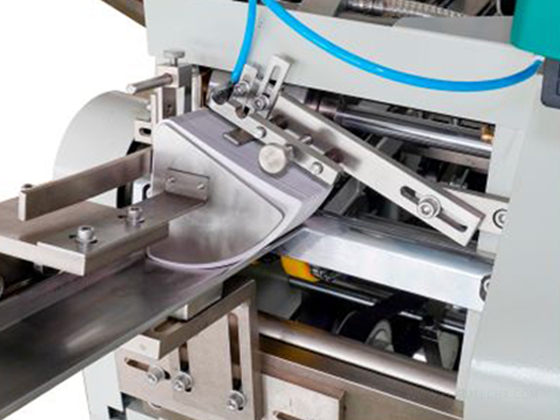 Ice cream cone wrapper machine