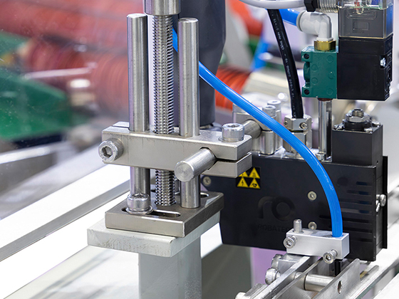 Ice cream cone wrapper machine