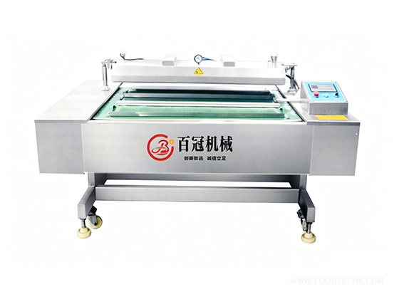 Continuous vacuum packaging machine